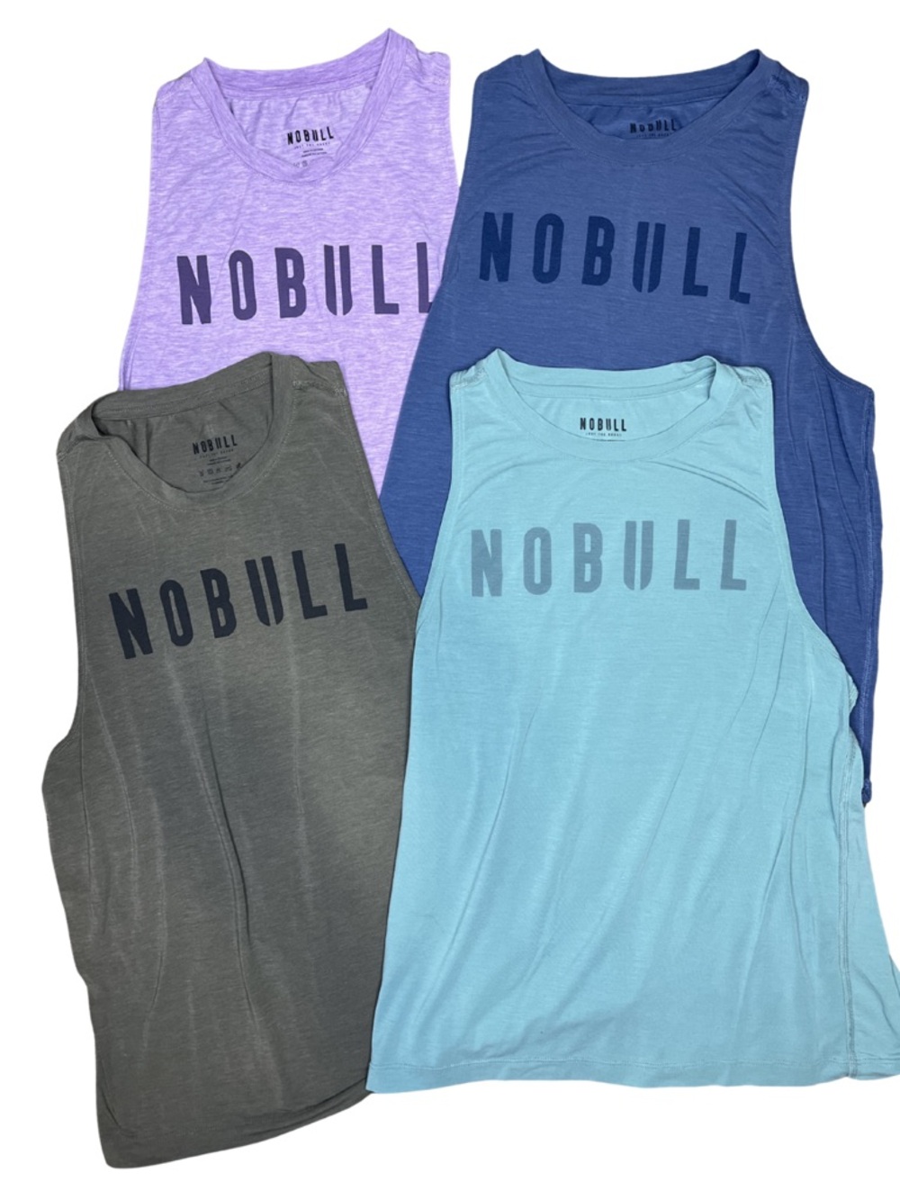 NOBULL Four-Pack Muscle Tanks - Lavender, Navy, Olive, Light Blue